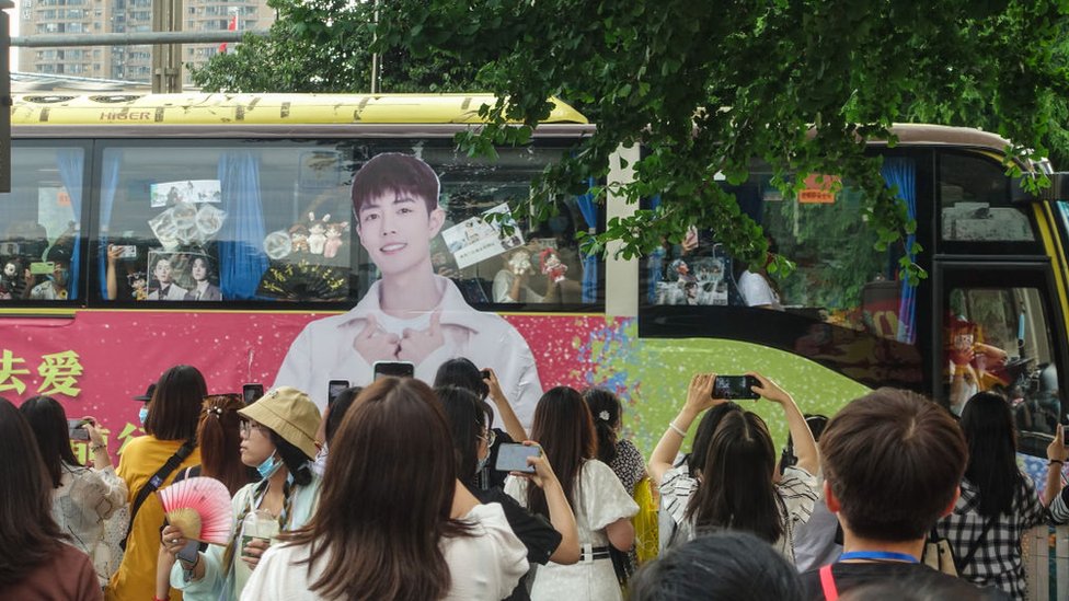 Fans chartered cars for parades and bought huge bouquets of flowers to celebrate their idol`s success.