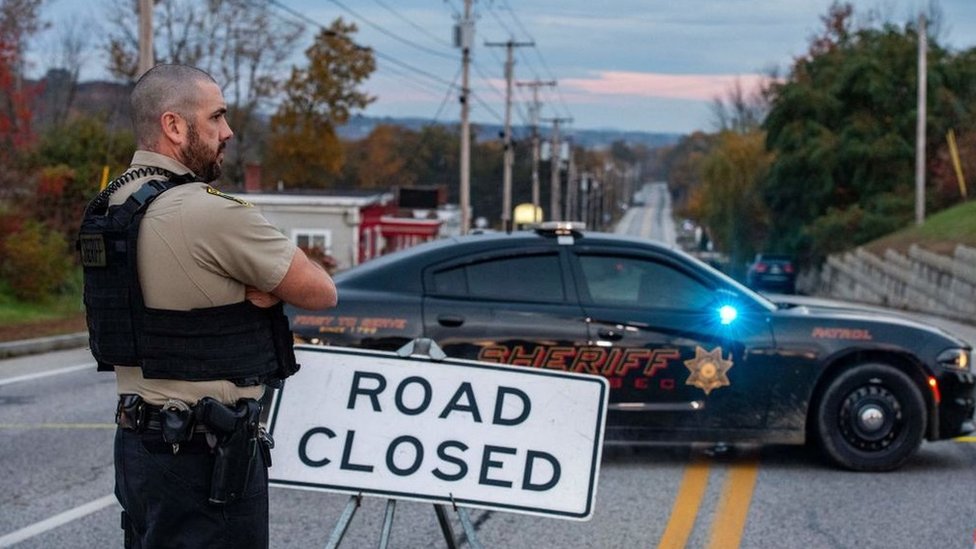 Police presence at Schemengees Bar where a mass shooting occurred yesterday in Lewiston, Maine on October 26, 2023