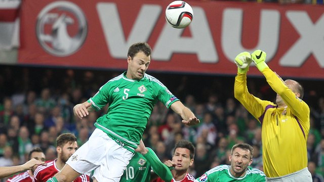 Jonny Evans rises highest to head on goal against Hungary at Windsor Park