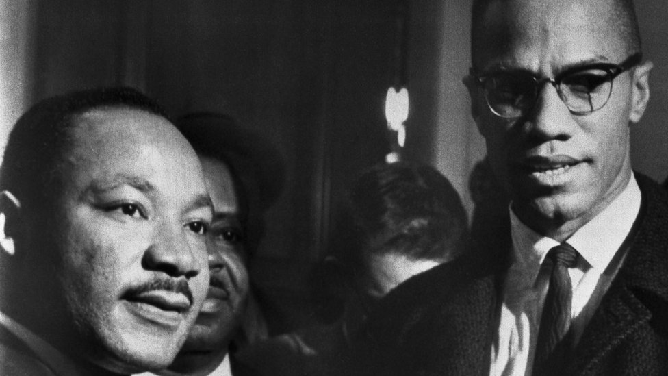 The brief, and only, meeting between Malcolm X (R) and Martin Luther King (L) in Washingon DC, 26 March 1964