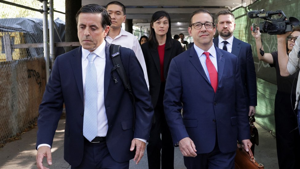 Linda Sun, a former aide to New York State Governor Kathy Hochul, exits Brooklyn Federal court accompanied by Chris Hu and lawyers, after Linda was charged with acting as an unregistered agent of China's government in New York City, U.S., September 3, 2024