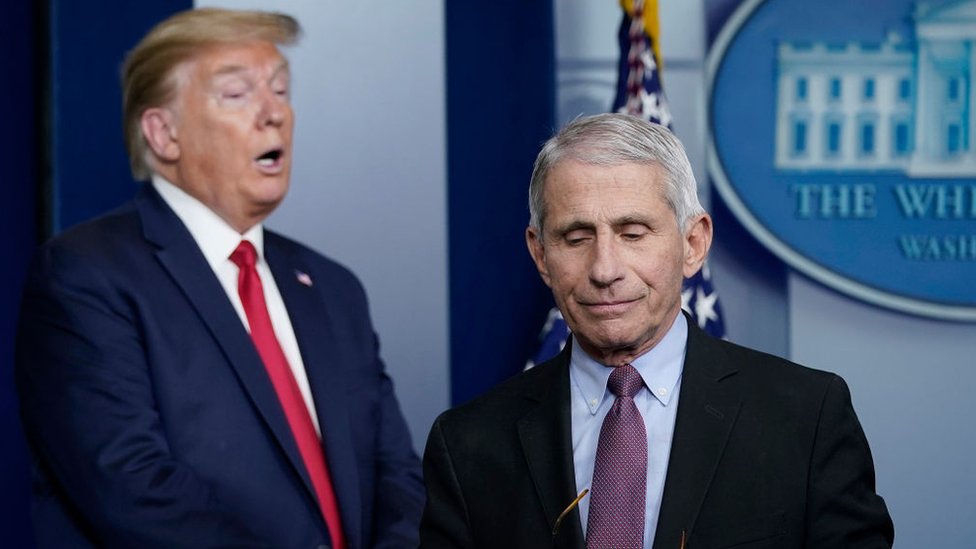 Dr. Anthony Fauci (R), director of the National Institute of Allergy and Infectious Diseases, and U.S. President Donald Trump participate in the daily coronavirus task force briefing at the White House on April 22, 2020