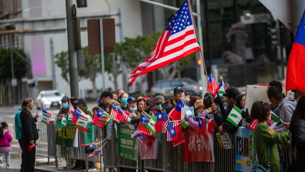 Taiwanese supporter wave flags, sing, and yell as they wait for Taiwan President Tsai Ing-Wen to arrive at The Westin Bonaventure Hotel on Tuesday, April 4, 2023, in Los Angeles, CA.