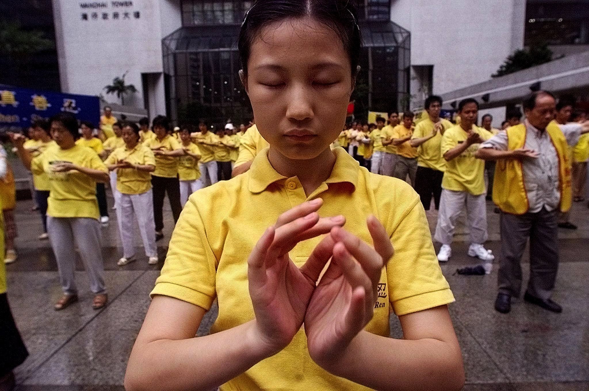 Falun Gong members practising openly in the street in Hong Kong in May 2001