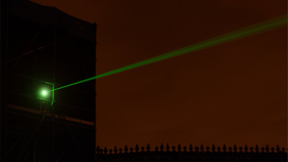   Laser coming out of a window 