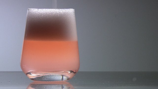 Pink fizzy drink in a glass