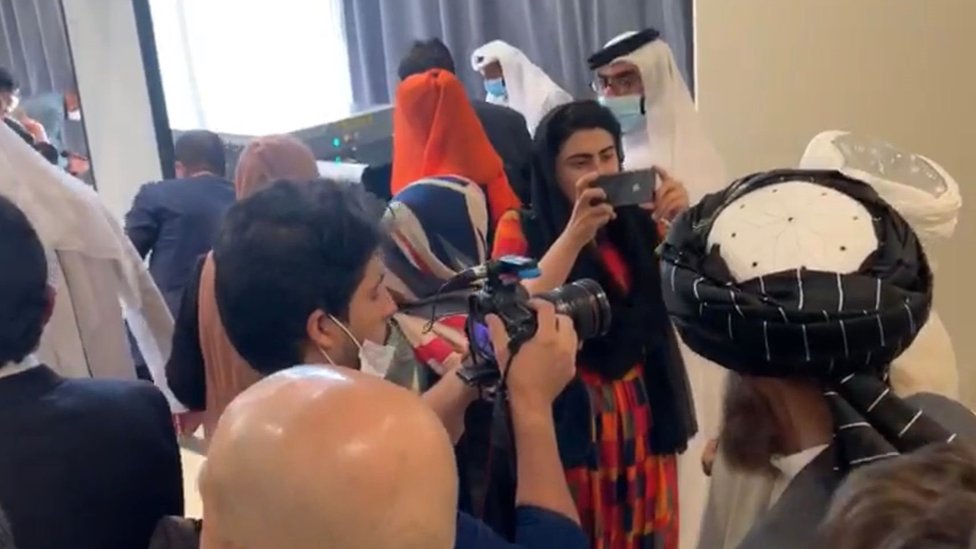 Shazia Haya taking pictures of the Taliban delegation in a Doha hotel