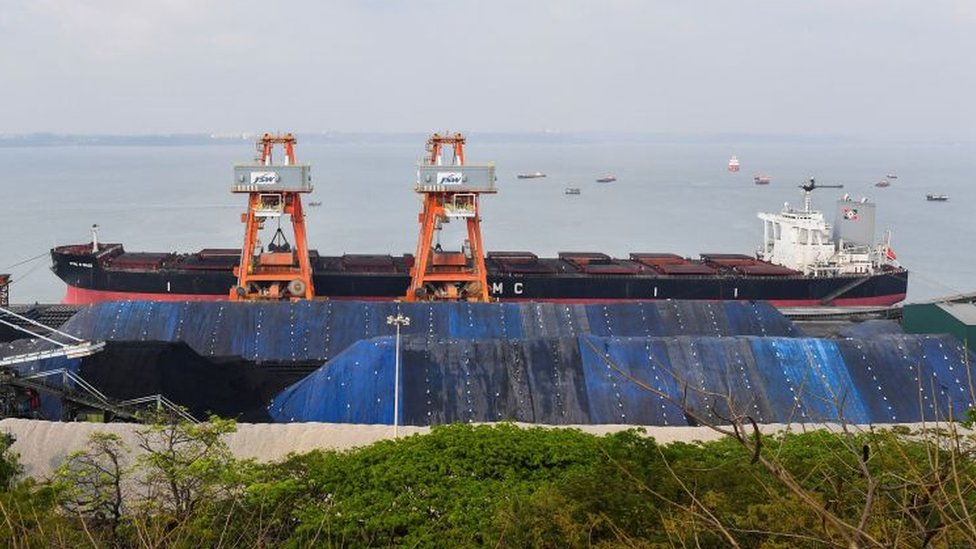 Coal being unloaded at the Mormugao Port Trust in Goa.