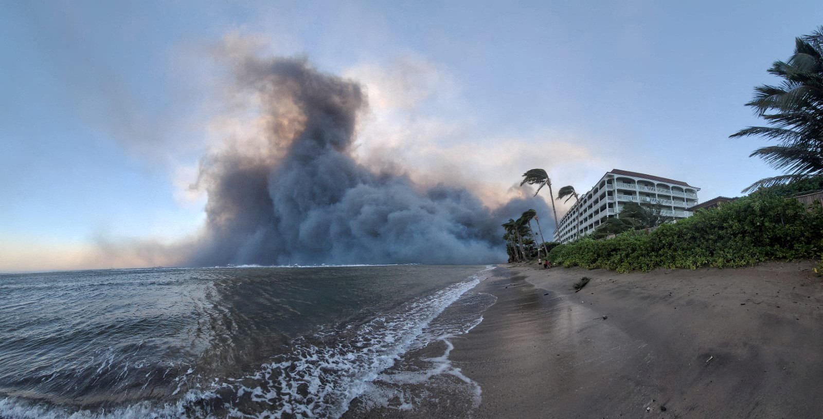 Smoke billows near Lahaina as wildfires destroy a large part of the historic town of Lahaina, Hawaii - 9 August, 2023.