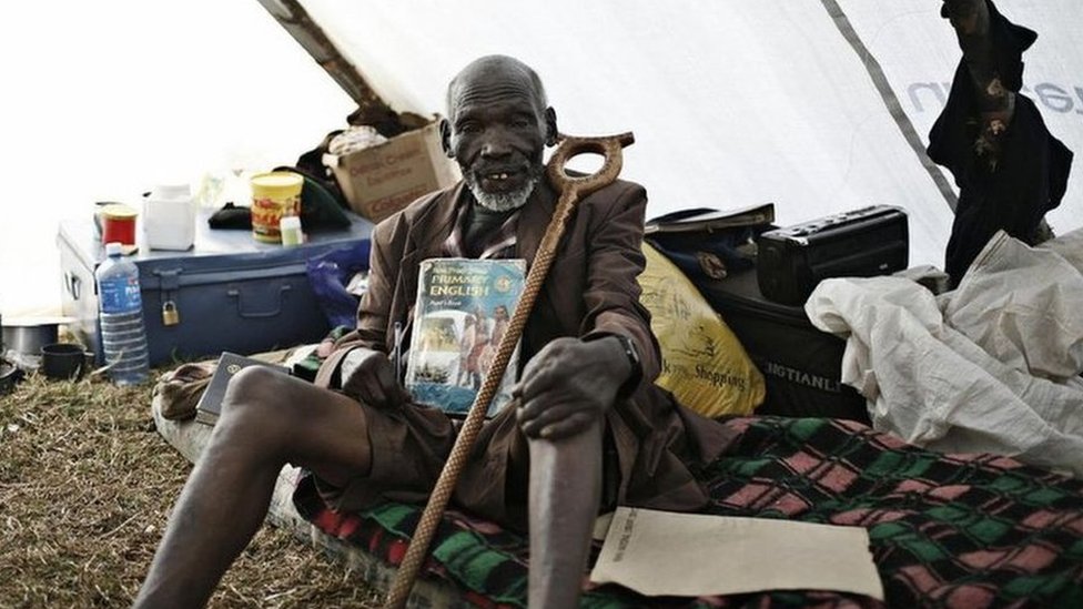 Kimani Maruge, sits inside his tent at a camp for internally displaced persons in Eldoret.