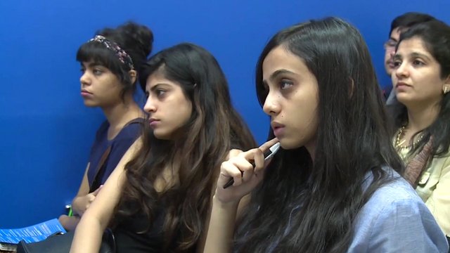 Indian women listening to a presentation