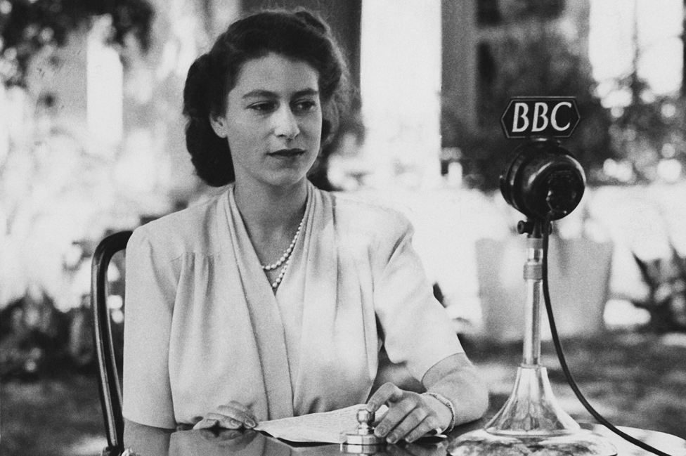 Princess Elizabeth makes a broadcast from the gardens of Government House in Cape Town, South Africa, 21 April 1947.