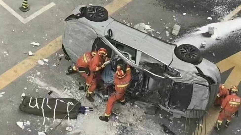 Two killed as Nio electric car falls from third floor office in Shanghai