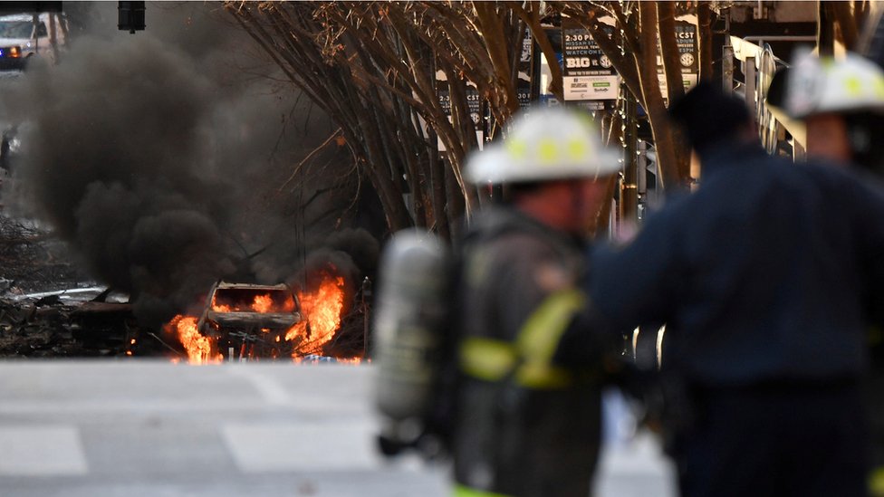 Firefighters at the scene of an explosion in Nashville, Tennessee (25 Dec)