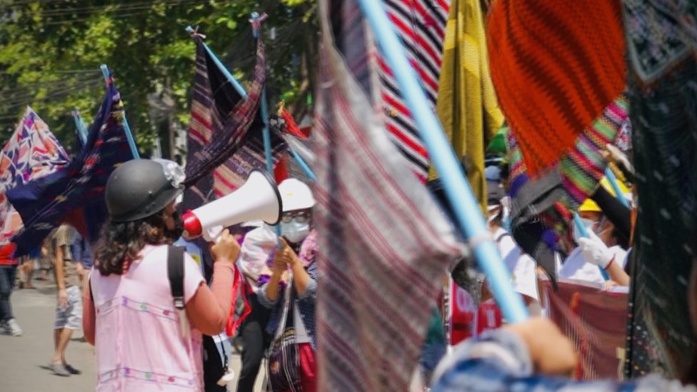 Protestors using sarongs as flags in Myanmar