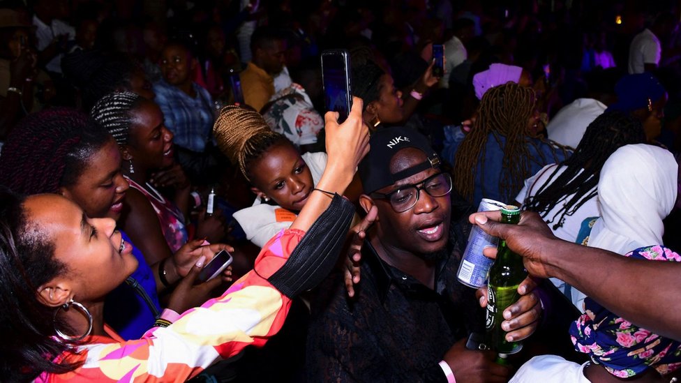 Revellers are seen at Levels Lounge after Uganda's president Yoweri Museveni reopened the economy, January 31, 2022.