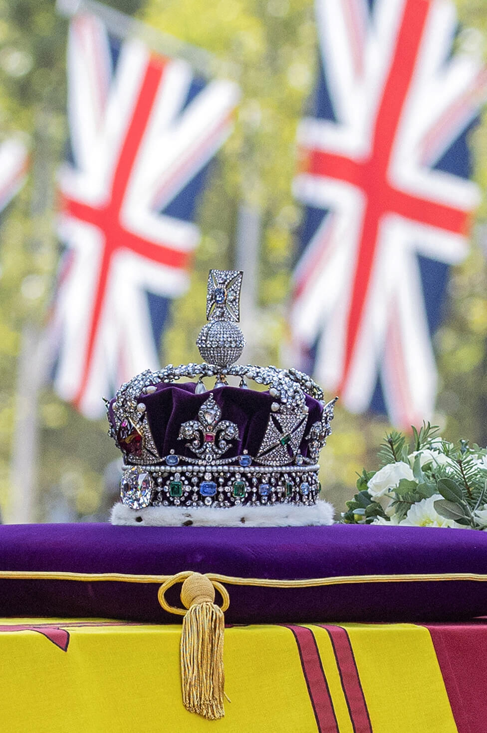 The coffin draped in the Royal Standard and topped with the Imperial State Crown