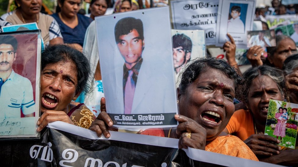 Протестующие на марше через Киллиноччи, Шри-Ланка, в феврале 2019 года.