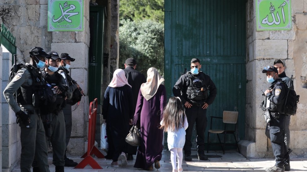 Muslim worshippers enter the Al-Aqsa Mosque compound in Jerusalem`s old city