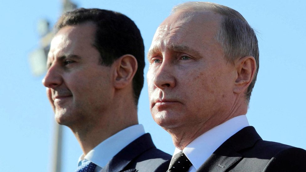 الرئيس السوري بشار الأسد( يسارا) مع الرئيس الروسي فلاديمير بوتين (يمينا)