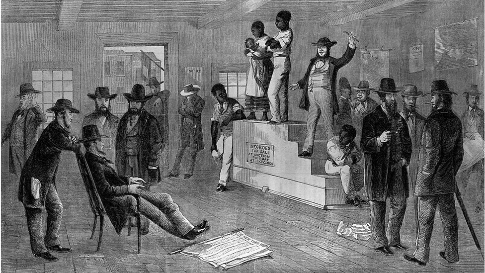 Auction sale for Negro slave family while perspective buyers look on smoking cigars, engraving, 1861. BPA2# 5154