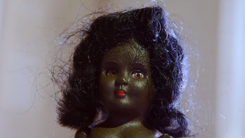 a black doll