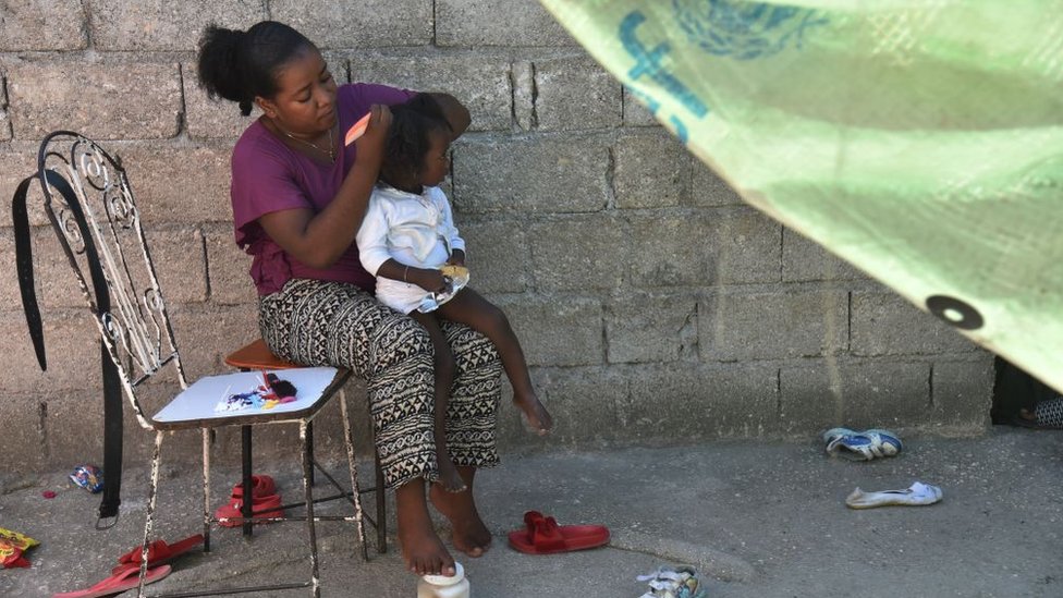 Mujer y niña en Haití