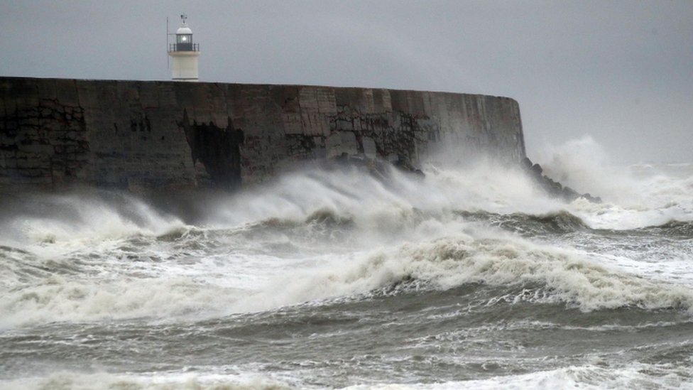 Cargo ship hits barge in Storm Angus - BBC News