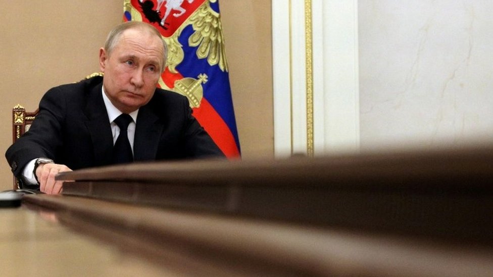 Vladmir Putin at a government meeting