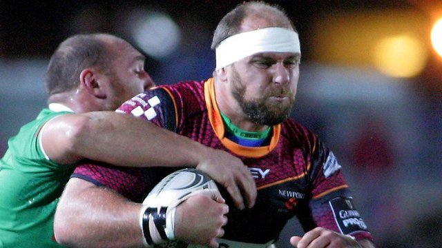 Rynard Landman of Dragons is tackled by Treviso's Davide Giazzon