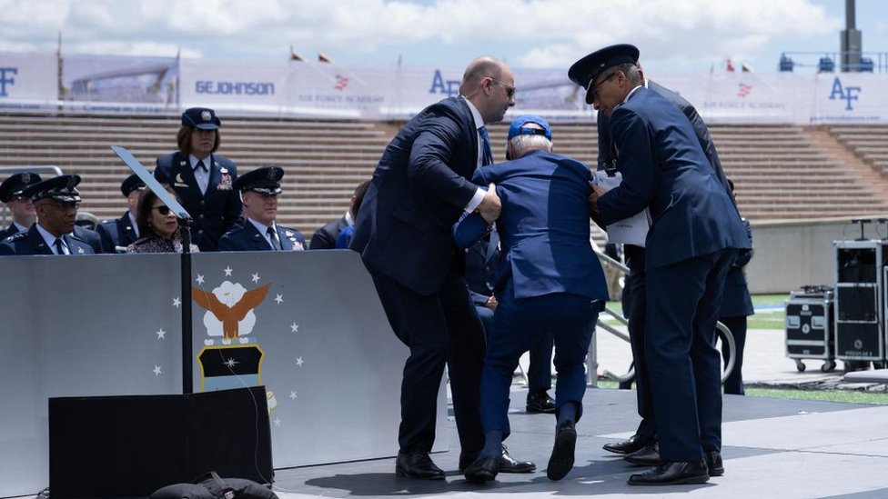 President Biden is helped up after his fall