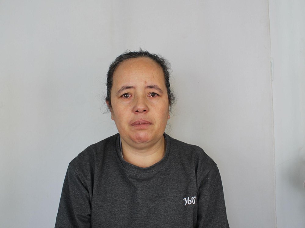 هاواغول توكل البالغة من العمر 50 عاما احتجزت في معسكر لاعادة التثقيف في 2017 دون ذكر سبب ذلك