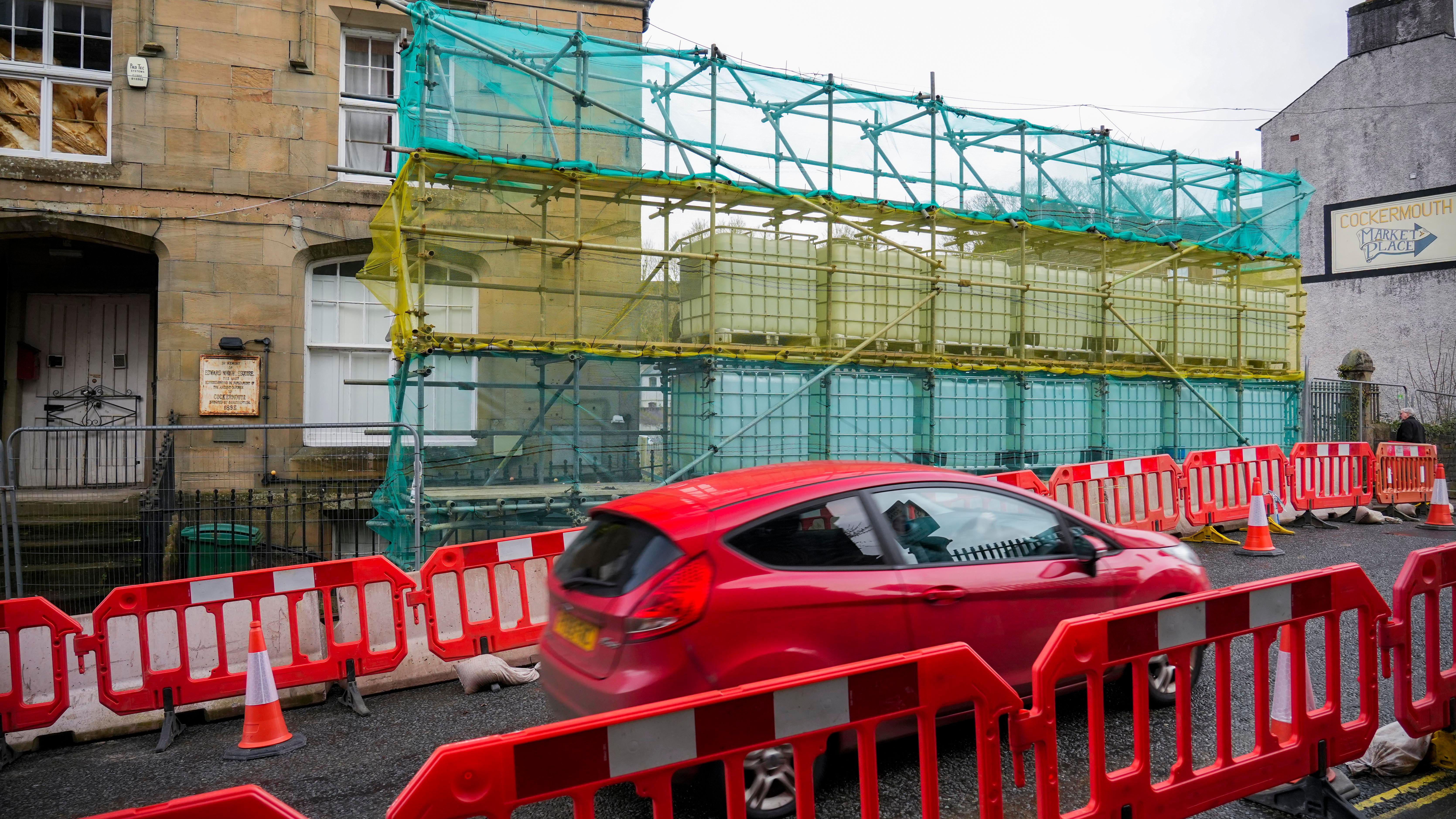 Cocker Bridge reopens two months after building collapse