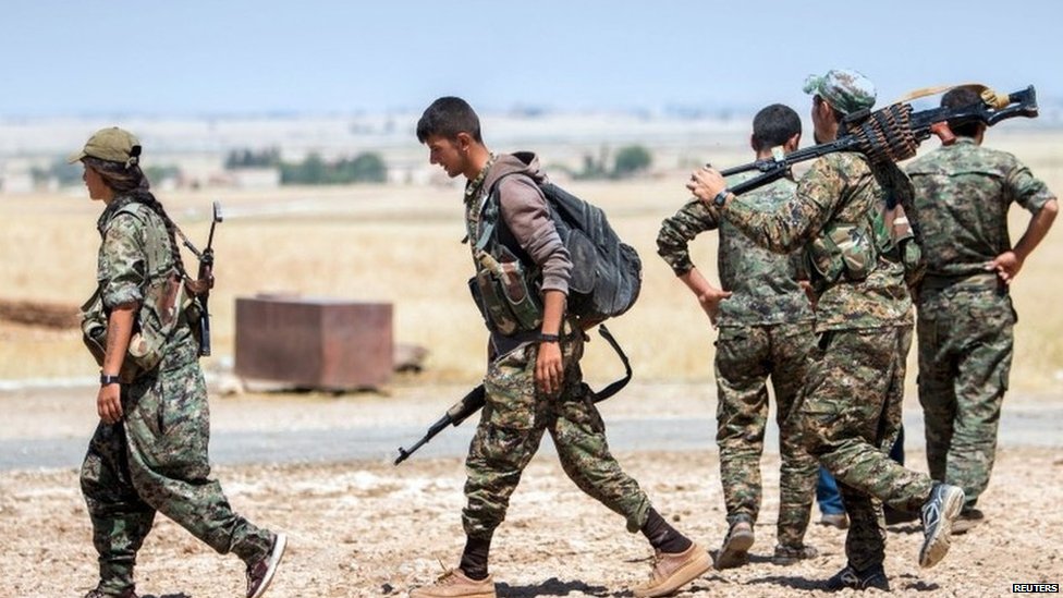 Курдские бойцы YPG на севере Сирии, июнь 2015 г.