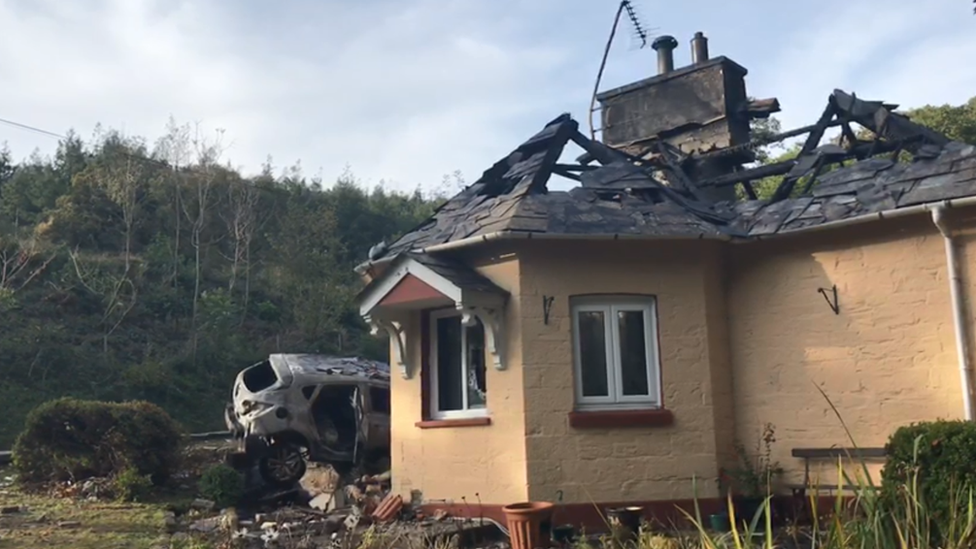 A38 crash Arson arrest after car crashes into house BBC News