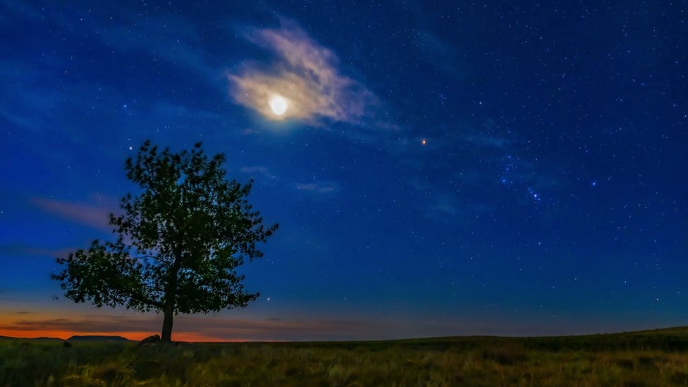 Orion at right, rising into the dawn sky in Canada