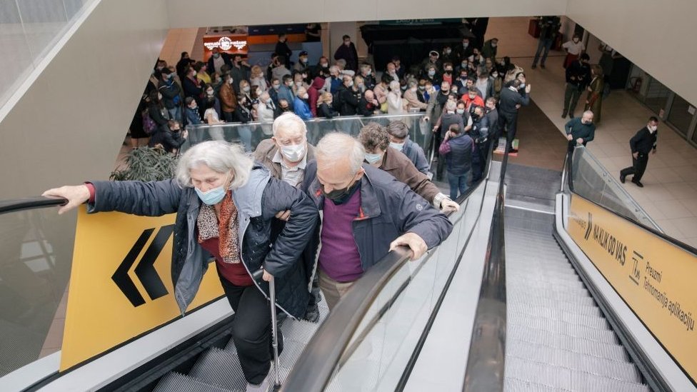 People queuing up for vaccination at a shopping centre in Belgrade
