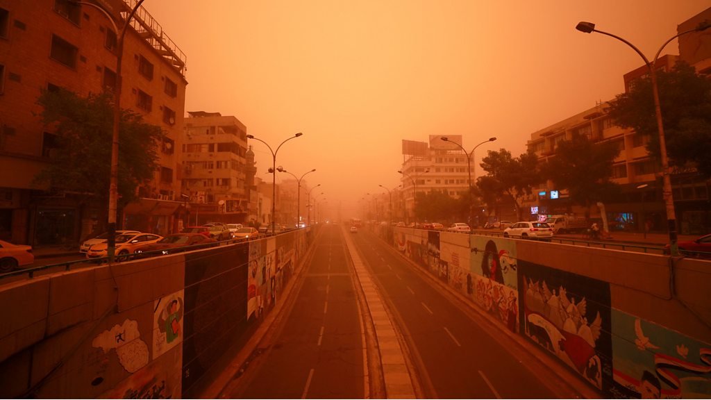 Orange skies as Iraq hit by dust storm