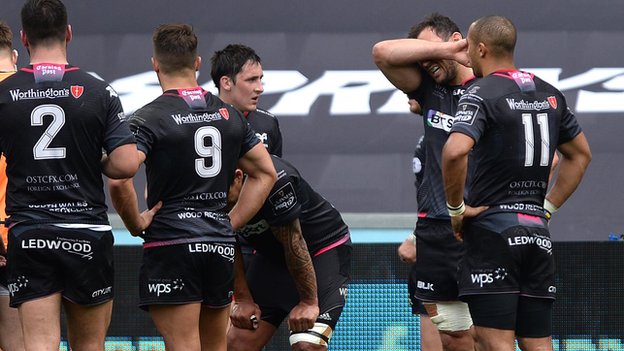 Ospreys players look dejected as they lose to Ulster