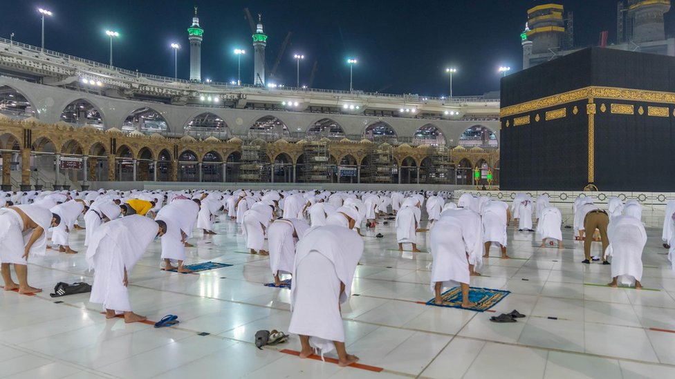 Muslims keep a safe social distance while performing Umrah at the Grand Mosque on 1 November 2020