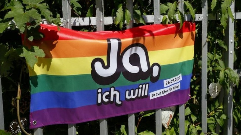 Rainbow flag in the Swiss capital Bern urging people to vote yes to same-sex marriage