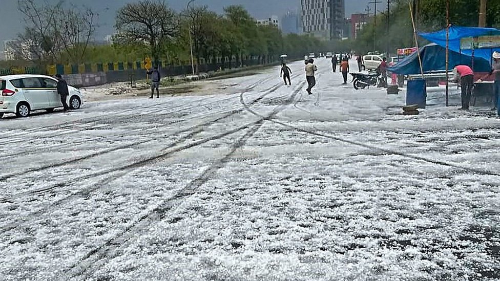 India capital Delhi enjoys unusual hail storm