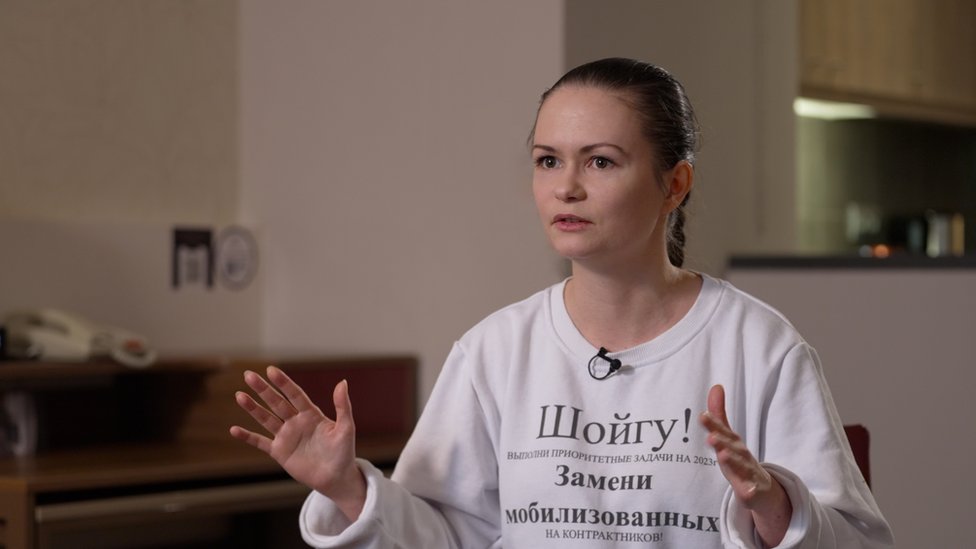 Maria Andreeva sits in chair during interview