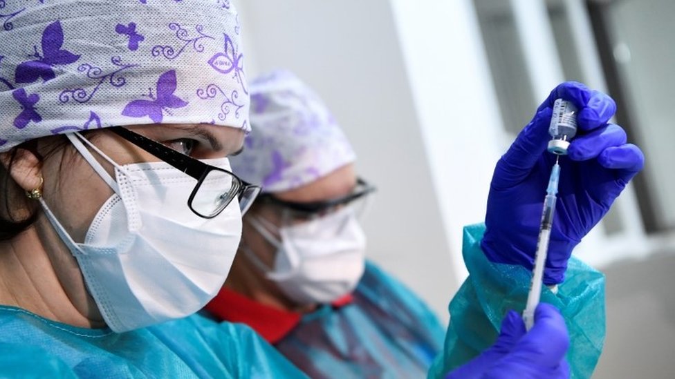 A healthcare worker fills a syringe with the Pfizer-BioNTech COVID-19 vaccine at the University Hospital, as the coronavirus disease (COVID-19) outbreak continues, in Nitra, Slovakia, December 26, 2020