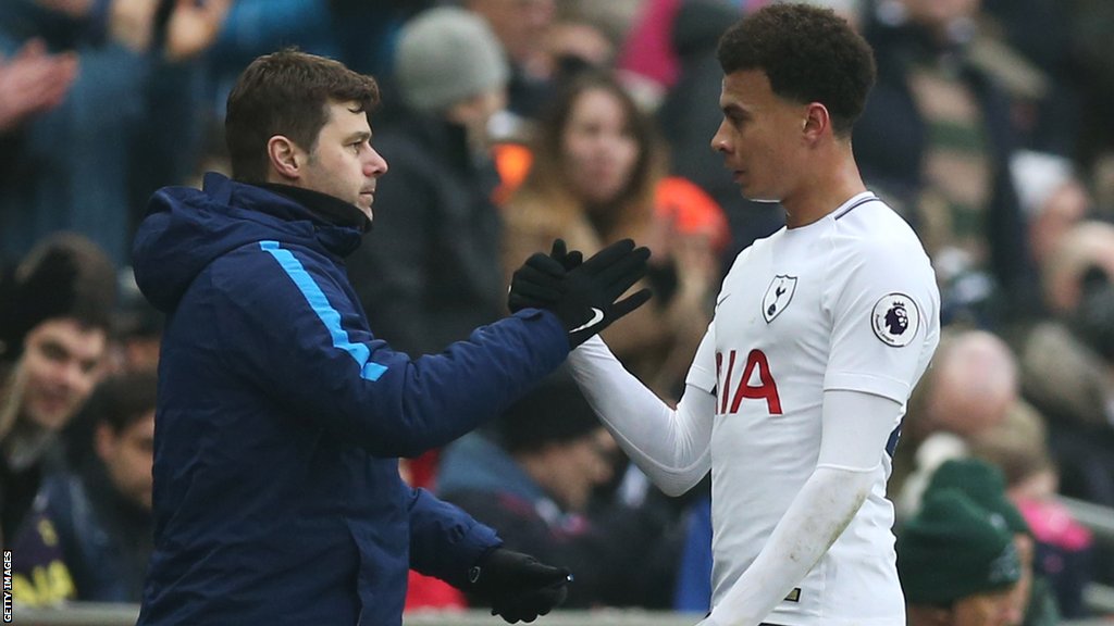 Then Tottenham manger Mauricio Pochettino (left) and midfielder Dele Alli (right) high five