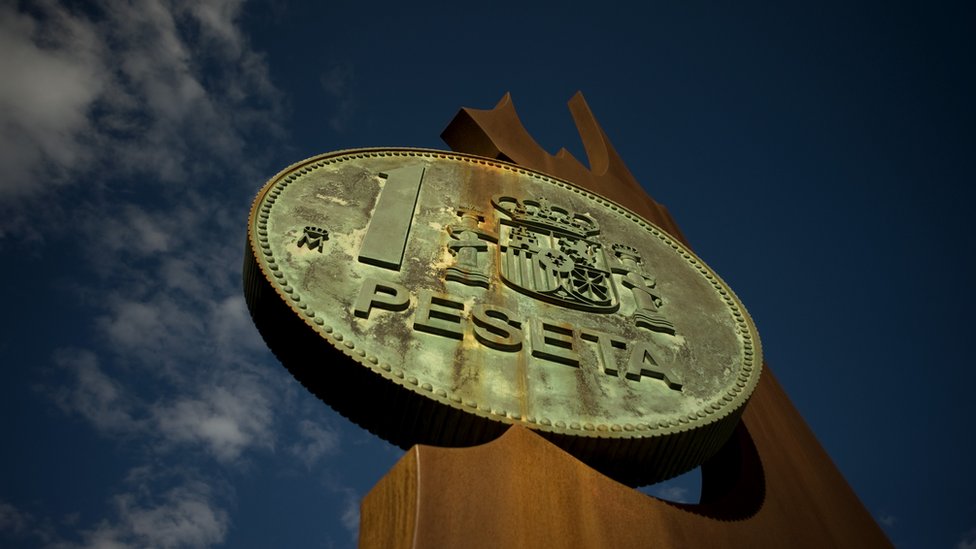 ¿Peseta? ¿pela? ¿euro? Cartel con una peseta.