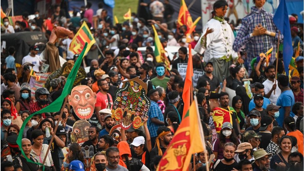 Protesters take part in an anti-government demonstration near the president's office in Colombo on April 30, 2022, demanding President Gotabaya Rajapaksas resignation over the country's crippling economic crisis.
