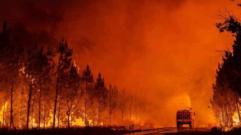A fire engine battles a wildfire in the Gironde region, south-western France. Photo: 9 August 2022