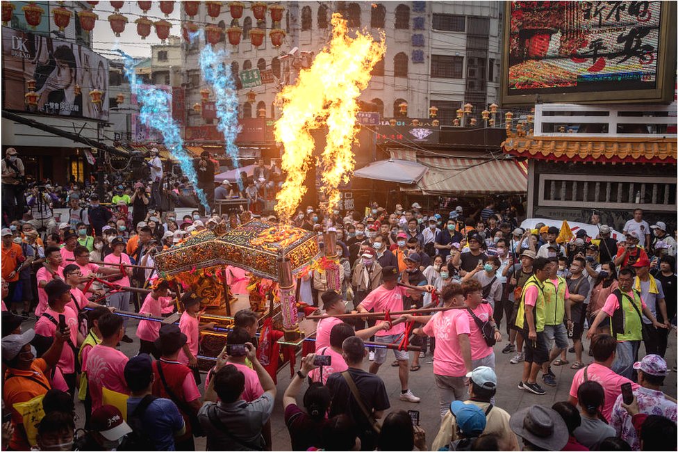 People take part during a ceremony to honour sea goddess Mazu, during the first day of the Dajia Mazu Pilgrimage at the Dajia Jenn Lann Temple on April 21, 2023 in Taichung, Taiwan. The Dajia Mazu Pilgrimage is one of the largest religious festivals in Taiwan.