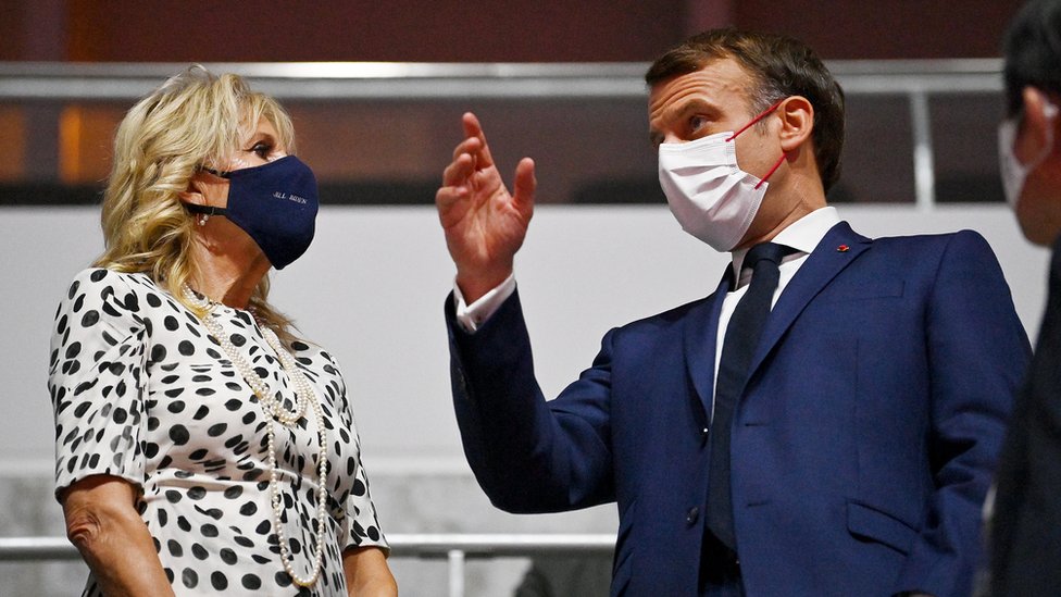 U.S. First Lady, Jill Biden and French President Emmanuel Macron are seen prior to the Opening Ceremony of the Tokyo 2020 Olympic Games at Olympic Stadium on July 23, 2021 in Tokyo, Japan.